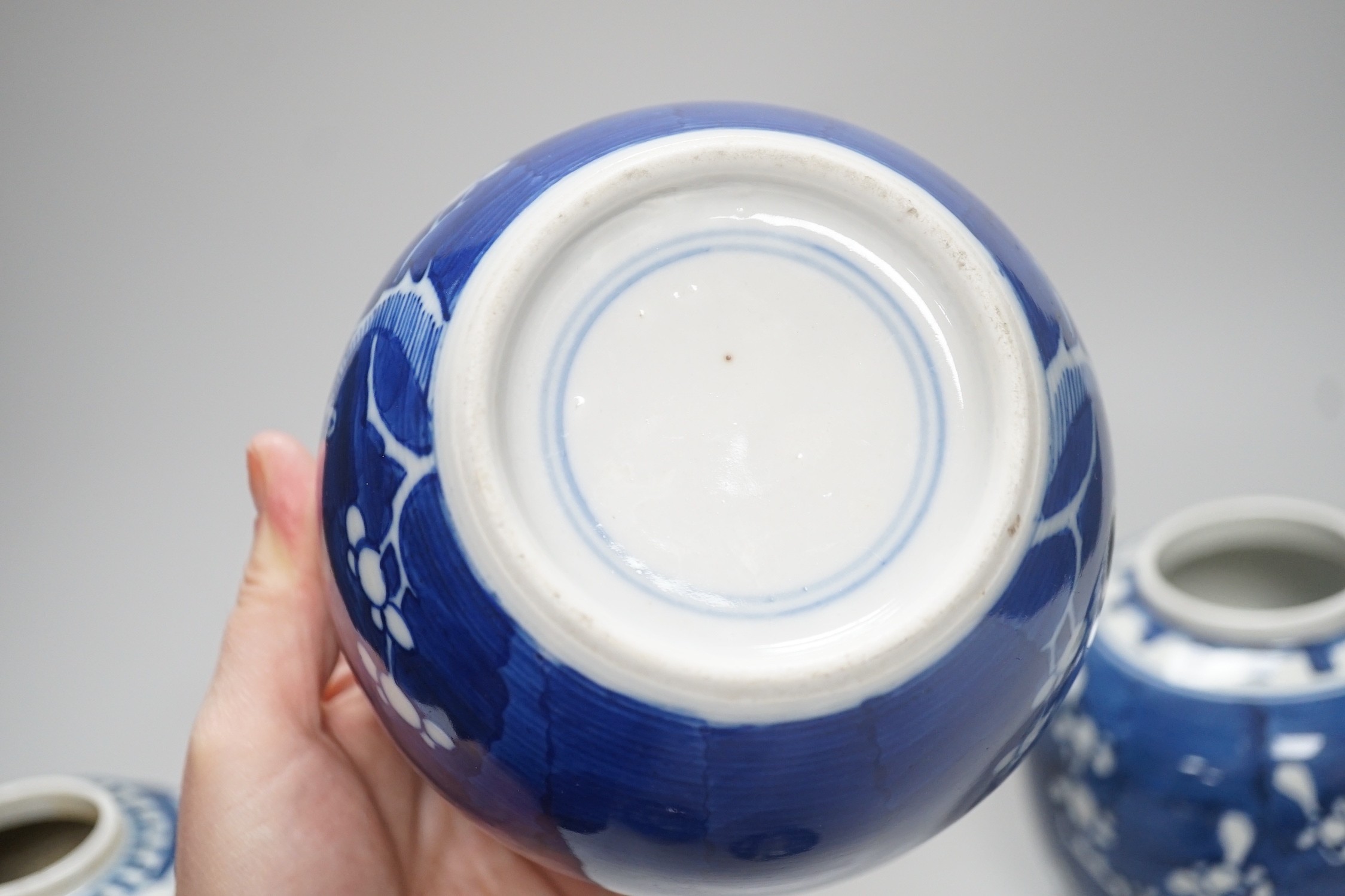 Three Chinese blue and white prunus jars, late 19th / early 20th century, tallest 16cm